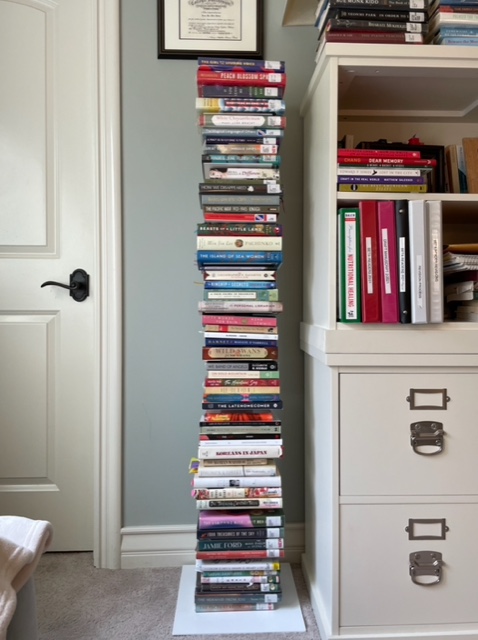 Tall stack of books