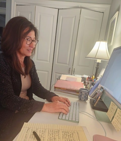 Rosa Kwon Easton working on her book