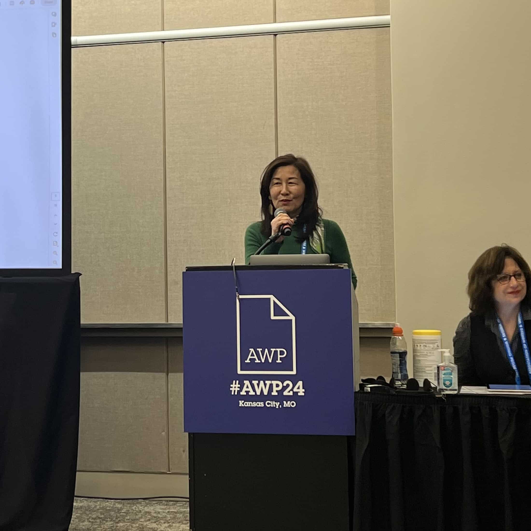 Rosa speaking at AWP event, Kansas City 2024