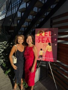 Rosa in front of Red Seal poster